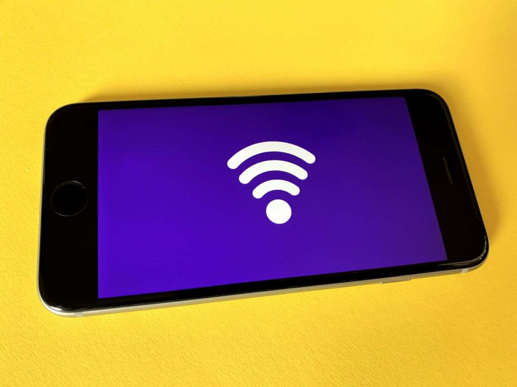 A phone with a WiFi signal image on the screen