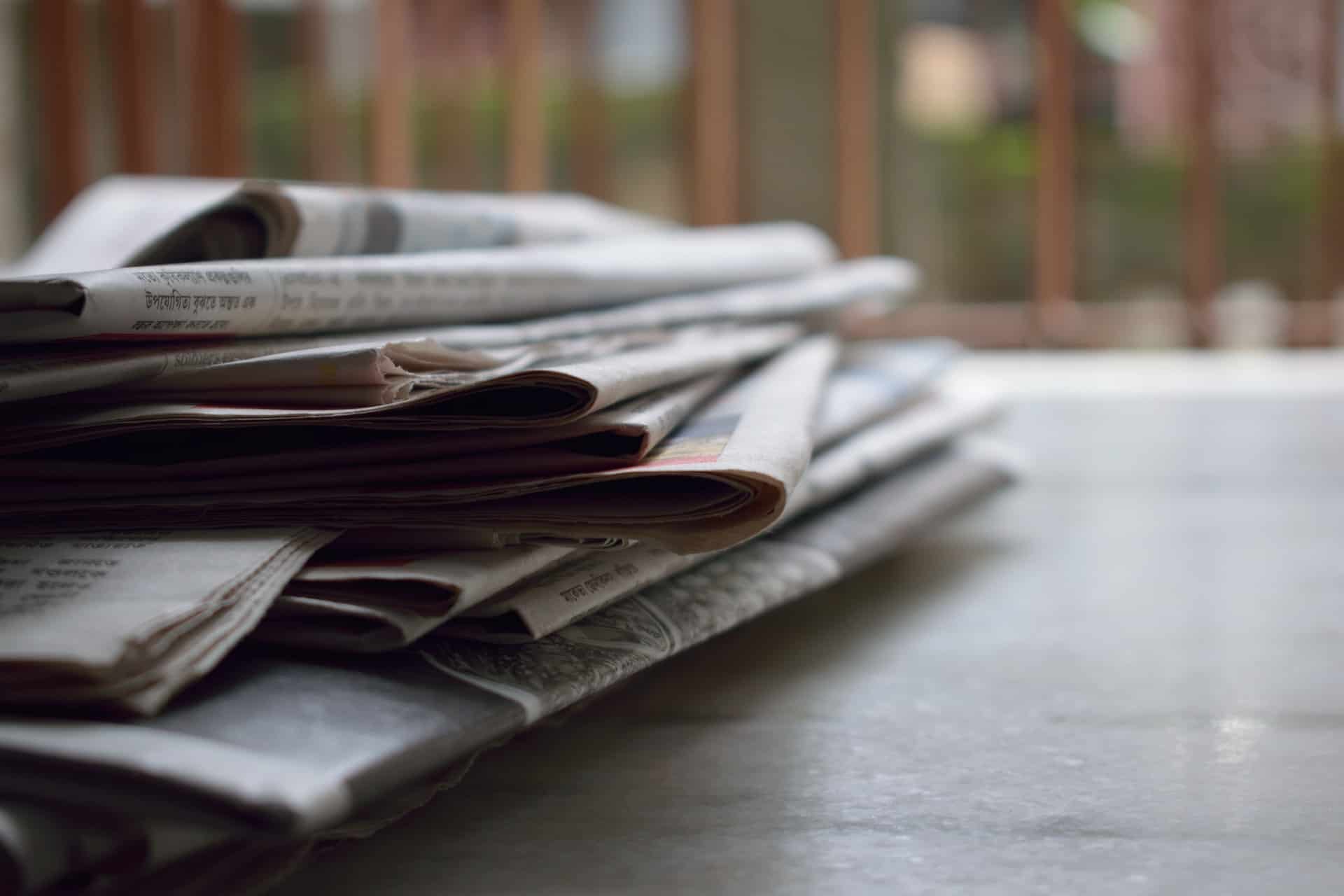 a stack of newspapers